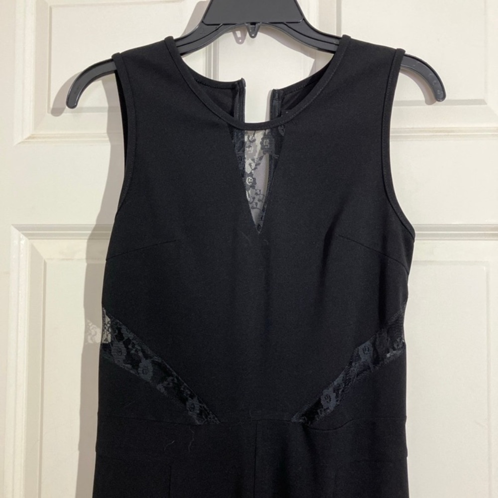 Elegant Black Sleeveless Bodysuit with Lace Accents